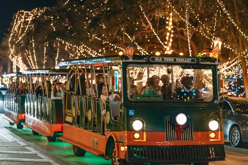 A trolley under the Nights of Lights, an alternative to St. Augustine carriage tours, Florida