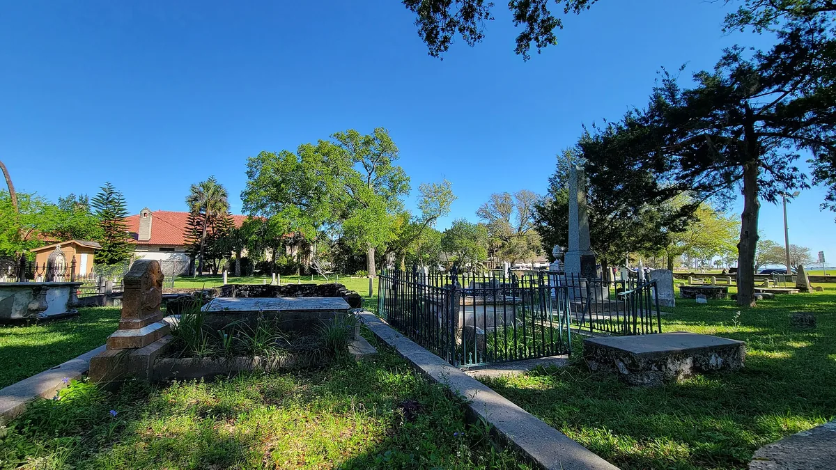 Graves in Huguenot Cemetery opposite the City Gate, a stop on St. Augustine carriage ghost tours